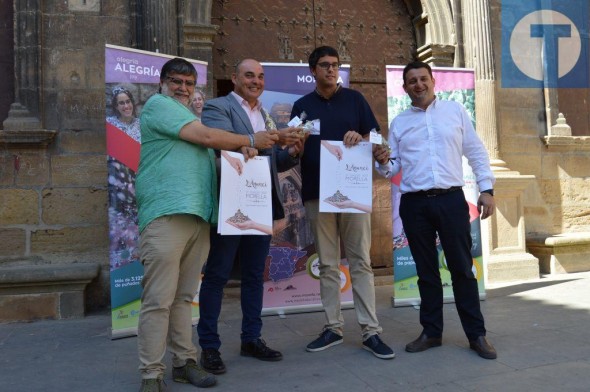 Morella promociona en Alcañiz el Anunci, la fiesta en la que se esparcen 60 toneladas de confeti