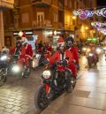 Papás noeles motorizados en Teruel llevan la ilusión de la Navidad a La Palma