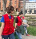 El paseo fluvial del  río Turia, más limpio gracias a la acción  de Cruz Roja y Libera