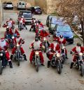 Los Papanoeles en moto reparten ilusión infantil en Alcañiz el día de Nochebuena
